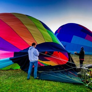Crew inflating hot air balloon before flight in the Southwest