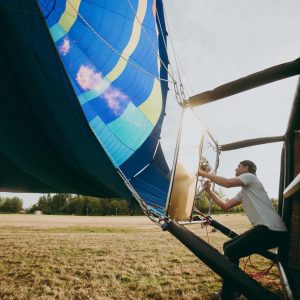 Chief Balloon pilot Eliav inflating the 10 passengers hot air balloon on a summer day in Seattle Washington